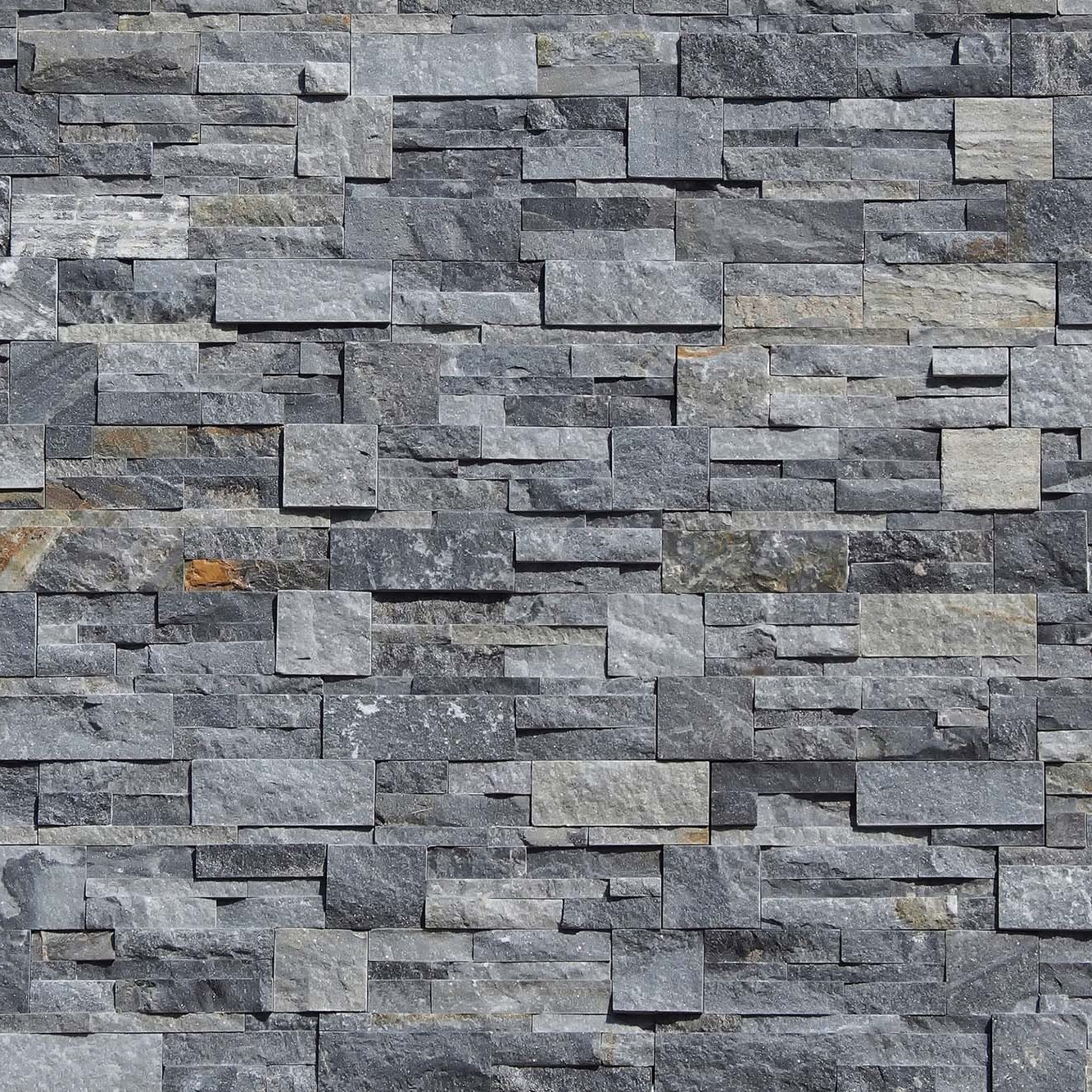 Quartzite natural stone cladding for external walls. Background and texture