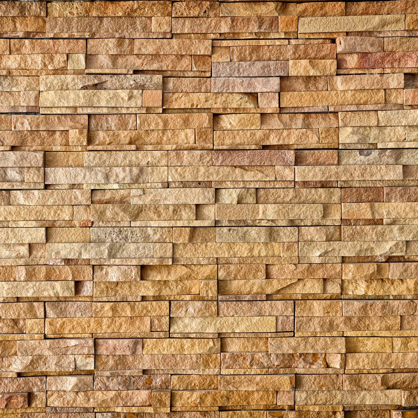 Closeup of natural stone wall cladding background